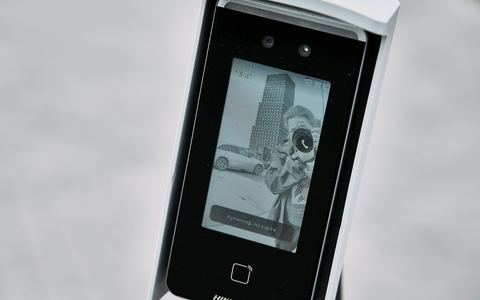A facial-recognition terminal, like the identity checks behind Video KYC